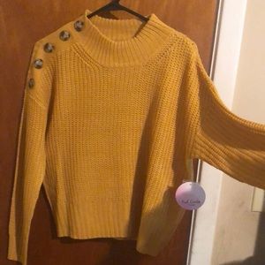 Women’s yellow sweater